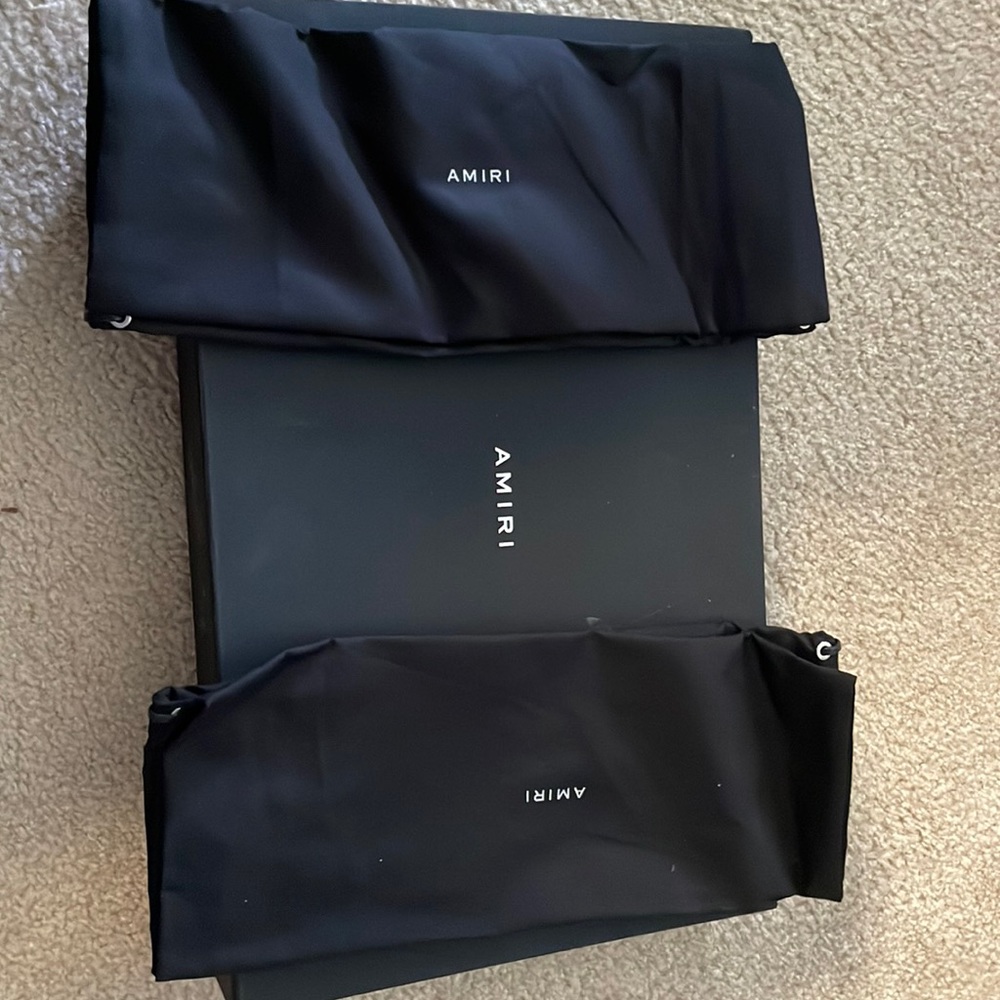 2 amiri dust bags and one clothing box